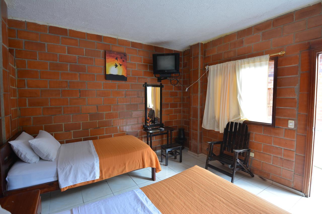 טנה Hosteria Las Heliconias מראה חיצוני תמונה